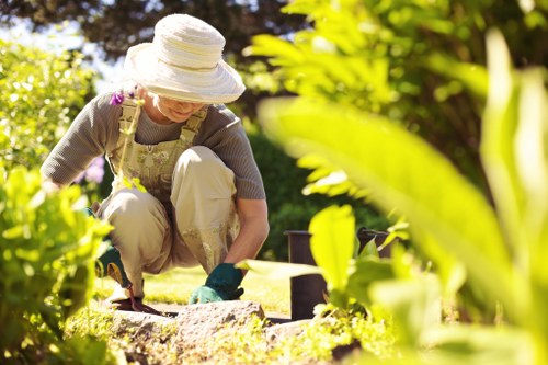 Gardener preparing tools with gloves and high-visibility vest